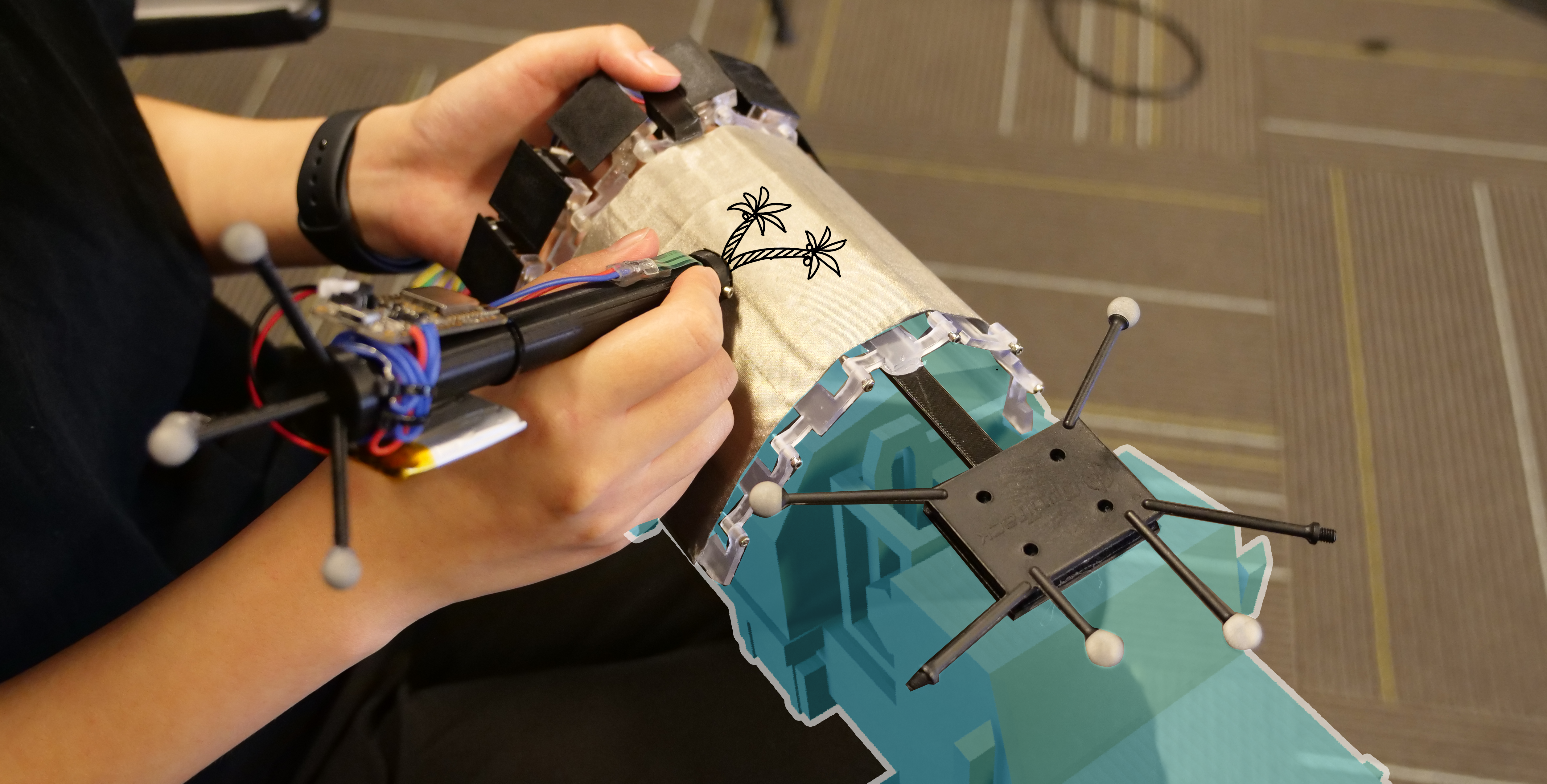 A shape-changing physical surface follows virtual geometry to support precise sketching in VR.